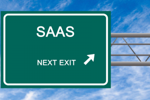 Green road sign that says SAAS Next exit