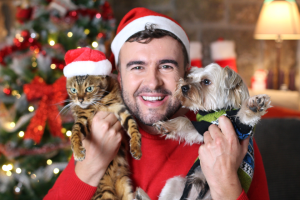 man, cat, and dog wearing santa hats | Product Promo Livestream: 27 Pet Products for Your Holiday Gift Guide