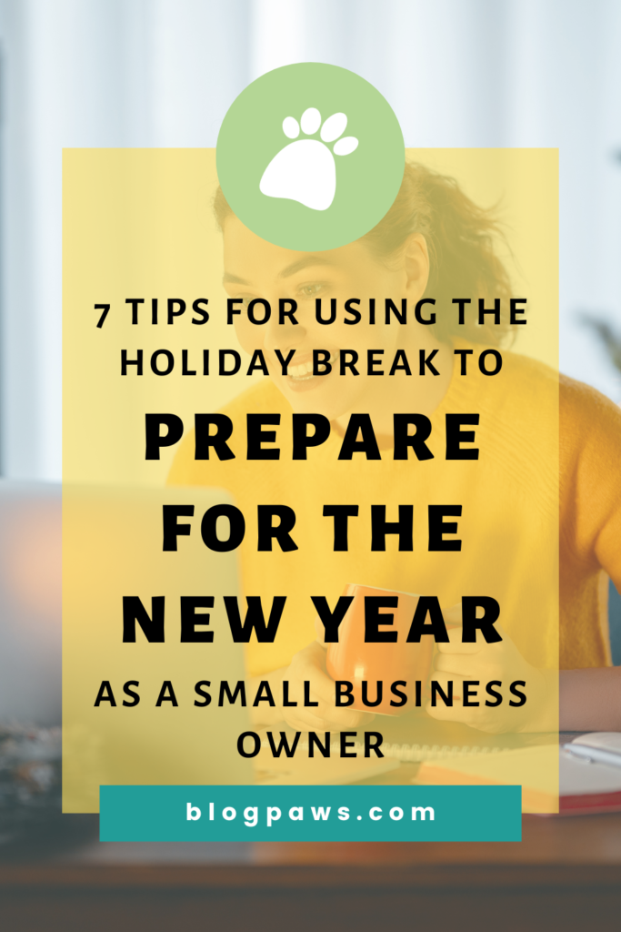 woman working on laptop surrounded by Christmas decor pin | 7 Tips for Using the Holiday Break to Prepare for the New Year as a Small Business Owner