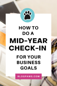 woman writing in a planner pin | How to Do a Mid-Year Check-in for Your Business Goals