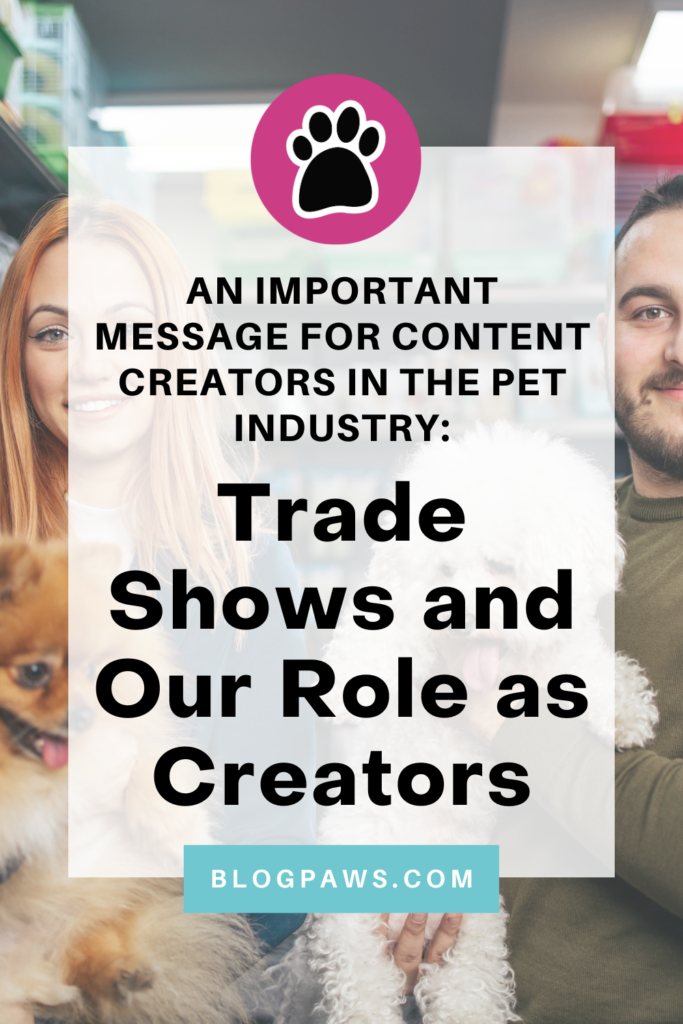 two people standing among shelves of pet products while holding dogs pin | Letter to the BlogPaws Community: Trade Shows and Our Role as Creators