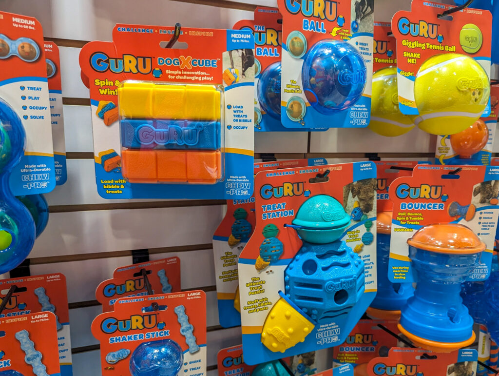 Dog X Cube with other brightly colored enrichment dog toys from GURU