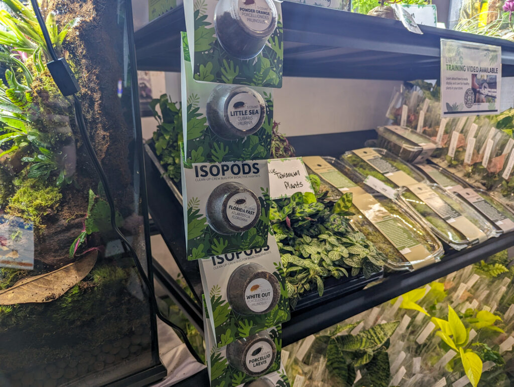 Josh's Frogs Isopod Hanger Cups displayed near plant products for vivariums