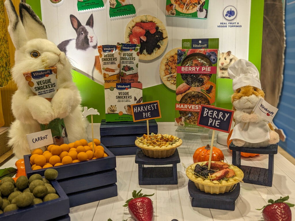 Display of Veggie Snackers (small round treats) and mini pies for small animals