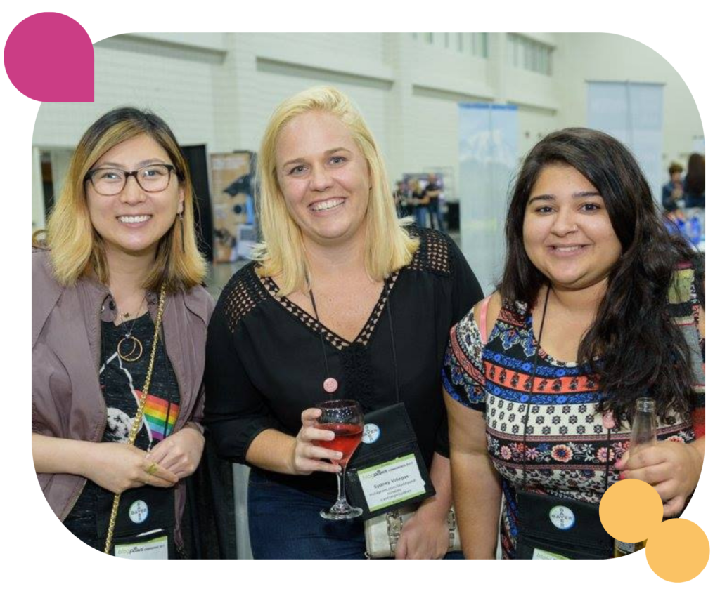 Three pet bloggers at a welcome reception event