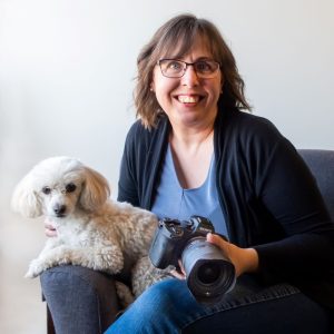 Monique Eckes with camera and dog