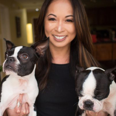 Hannah Zulueta with two french bulldogs