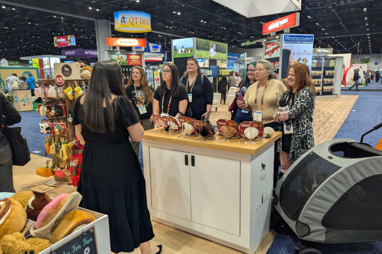 a group of people speaking at a pet trade show | The Pet Industry: Observations from Global Pet Expo 2025